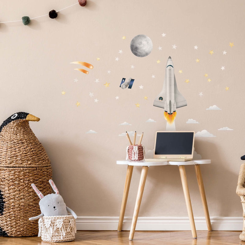 Pieni lähtevä avaruusraketti sisustustarra