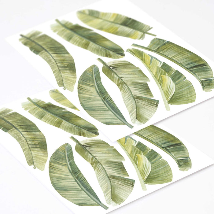 Piccoli adesivi murali con foglie di palma ad acquerello
