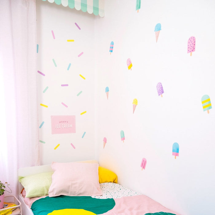 Pegatinas de pared con chispas de colores pastel